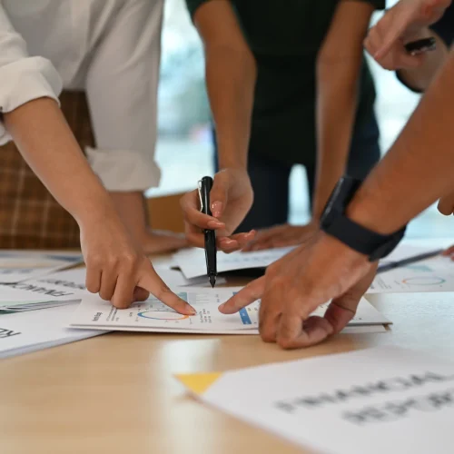 group-of-young-business-people-discussing-about-bu-2024-11-29-13-48-48-utc (1)